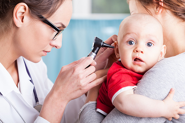 image of a baby being examined